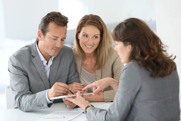depositphotos 53350007 stock photo couple signing loan grant